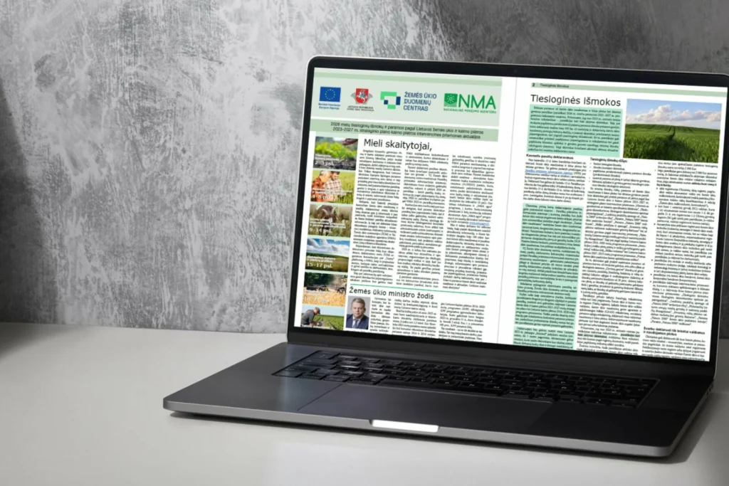 Atidarytas nešiojamasis kompiuteris, kuriame rodomas informacinis leidinys apie žemės ūkio paramą ir tiesiogines išmokas.